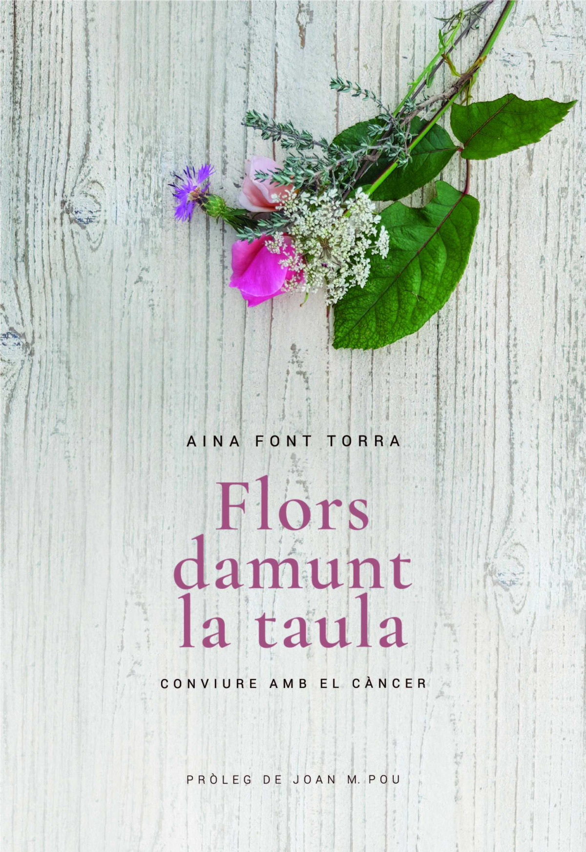 FLORS DAMUNT LA TAULA